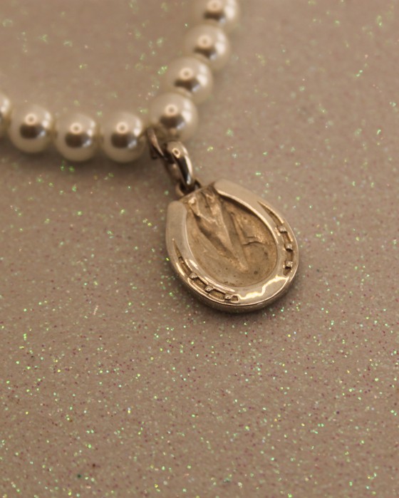 Finished sterling silver hoofprint pendant on a chain